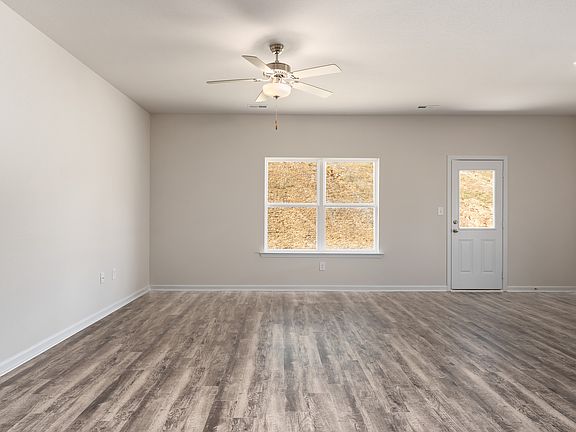 This bright family room is perfect for spending time with your friends and family