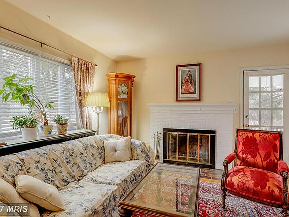 Living Room w/ wood burning fireplace