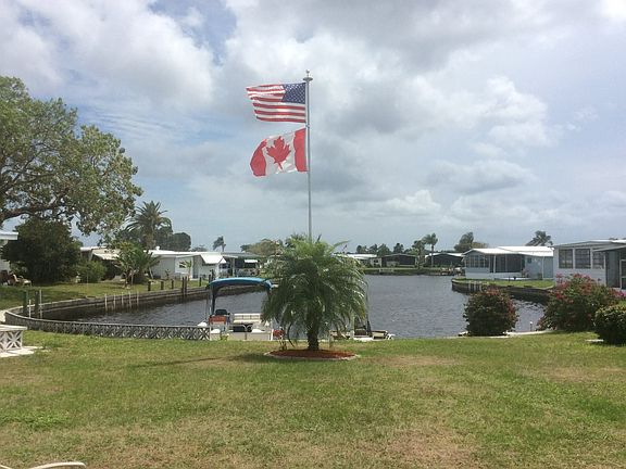 Canal waterfront with dock. 