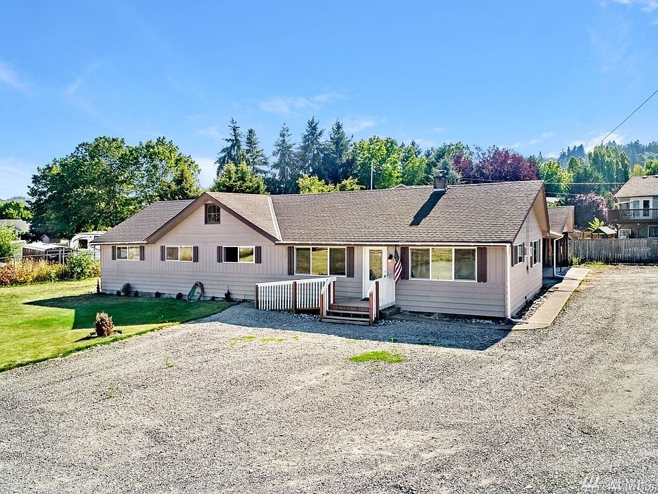 Shy 1 Acre Flat Lot! So much room here & great property potential for home business. Handicap accessible with ramp.