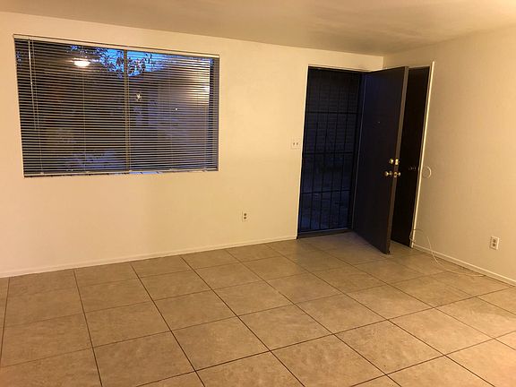 Living room/front door to courtyard