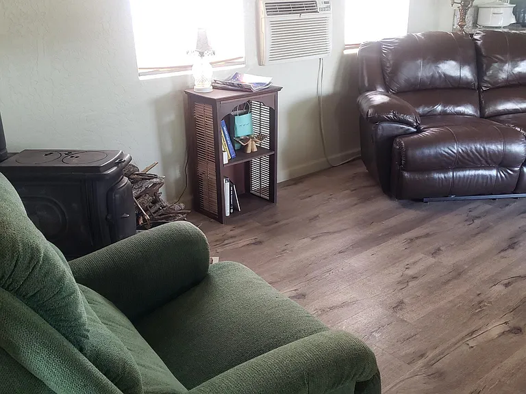 Wood stove and window air conditioner