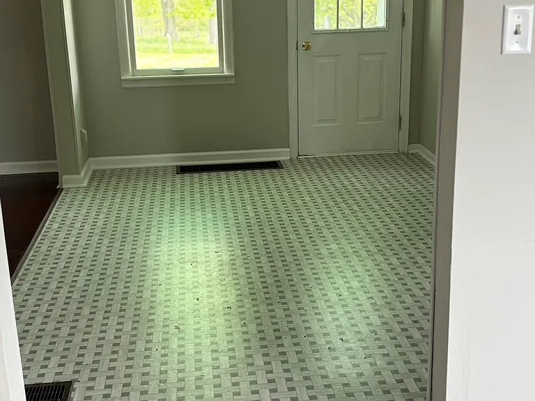 Breakfast nook exiting to covered back porch
