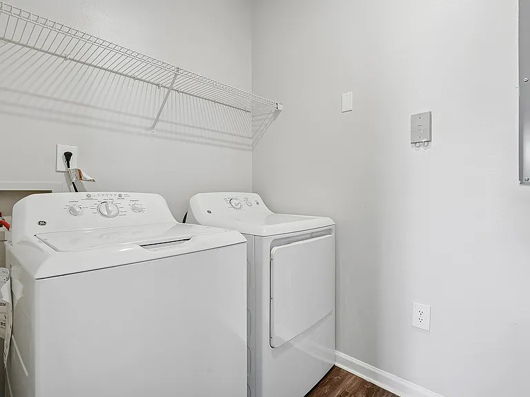 Modern laundry room in Haven at Birkdale Village