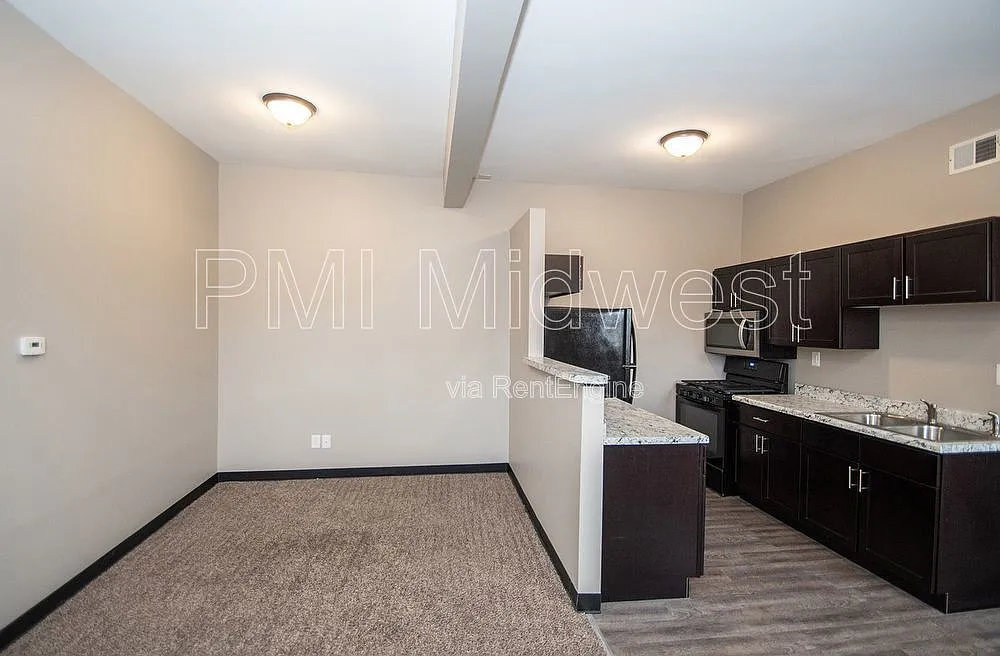 Building Photo - 2060 N Delaware St #12