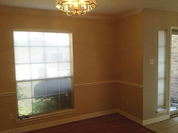 Do you entertain? Isn't this an attractive formal dining room? Please notice the wood floors, crown 