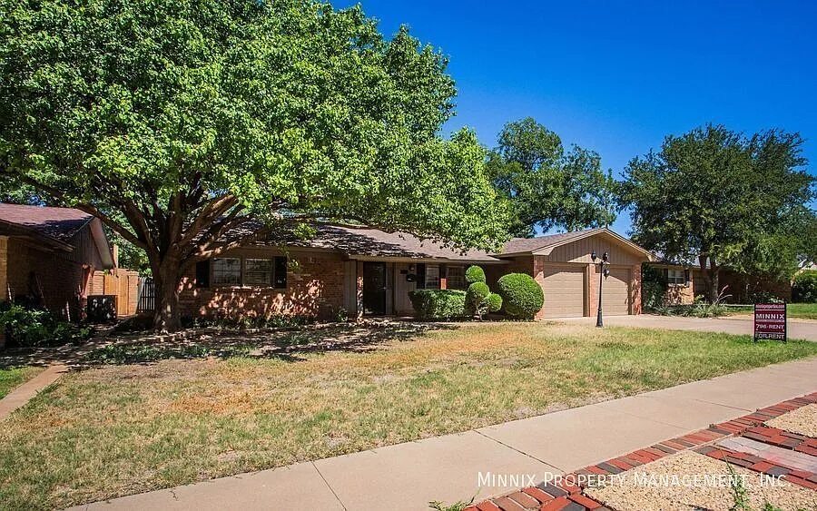3 bedroom/ 2 bath | Fireplace | 4104 64th St. — Photo 2