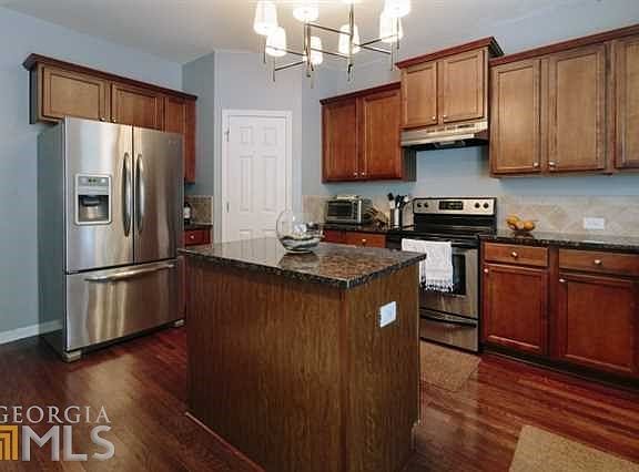 Stainless Steel Appliances And Granite