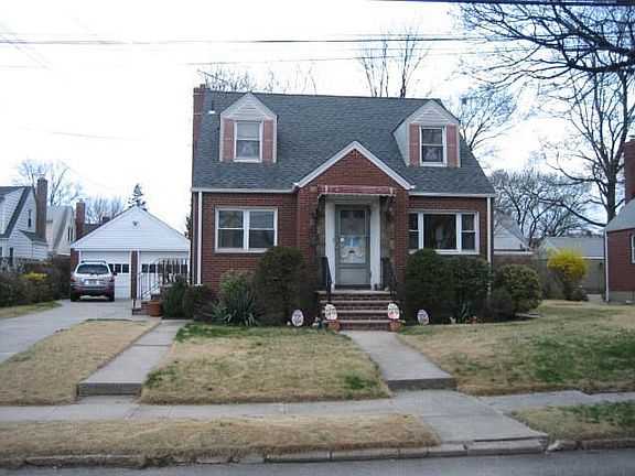 Exterior front showing 2 car garage 