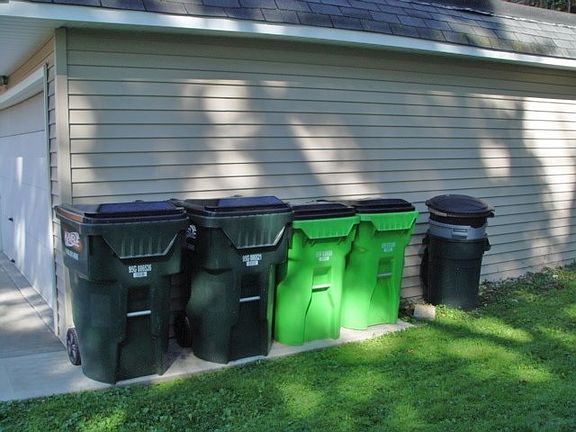 provide trash & recycle cans