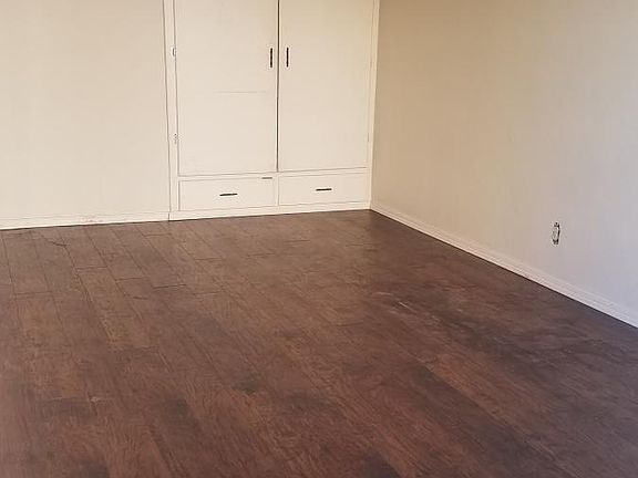 Bedroom with built-in closets