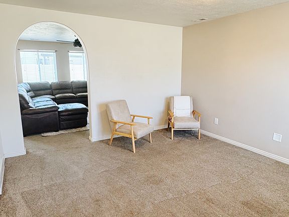 Front room | semi-private, and it leads to the family room/kitchen area