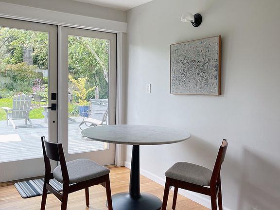 Dining space off kitchen - French doors lead to backyard