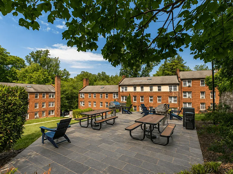 Park Crest Apartments Terrace with Grills and Picnic Tables and Lounge Chairs
