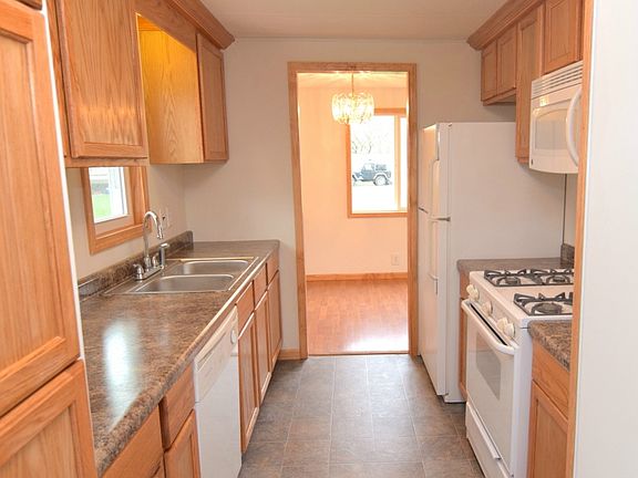 Newly updated kitchen featuring beautiful new cabinets and matching appliances.