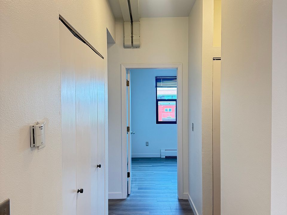 Hallway to bedrooms and bathrooms