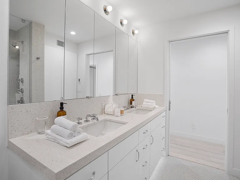 A refined vanity with designer finishes and plush towels.
Where elegance meets everyday comfort.