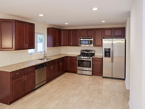 Cherry Cabinets and granite
