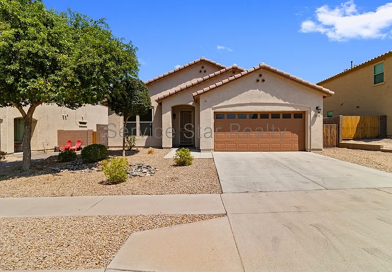 7309 S 12th Dr — Photo 1