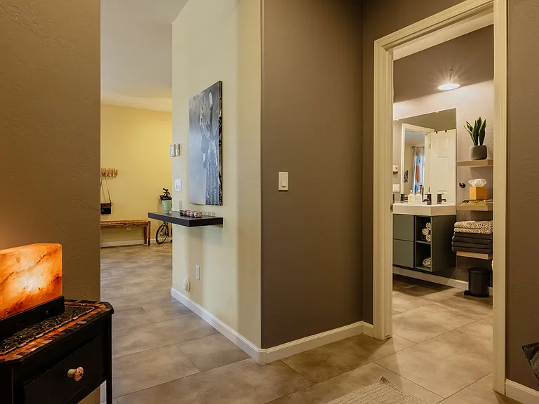 Private bathroom entrance from the bedroom area.