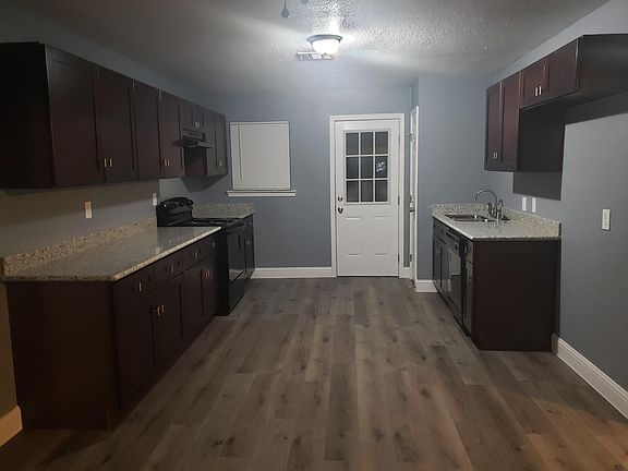Kitchen with new granite counter tops, cabinets , new stove and diswasher