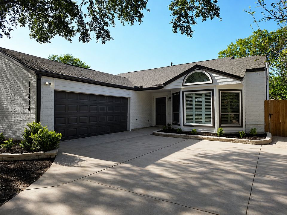 Front of the House - 2 Car Garage with a garage door opener