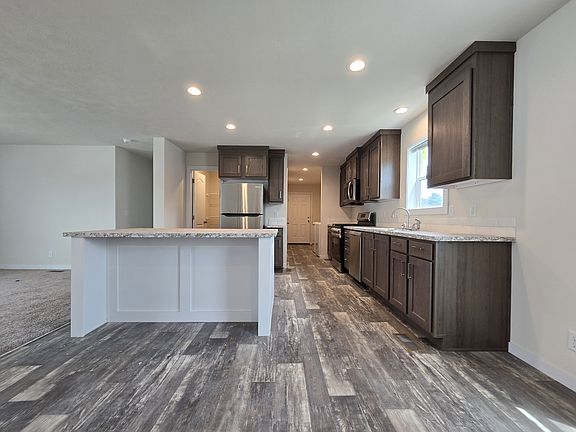 3rd image of 7204 E Grand River Ave Lot 433