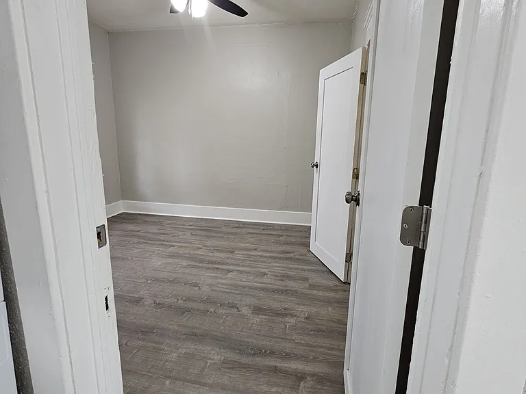Rear Bedroom 11' x 11' with ceiling fan