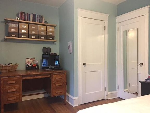 Master bedroom door and closet. This room has been painted a new color.