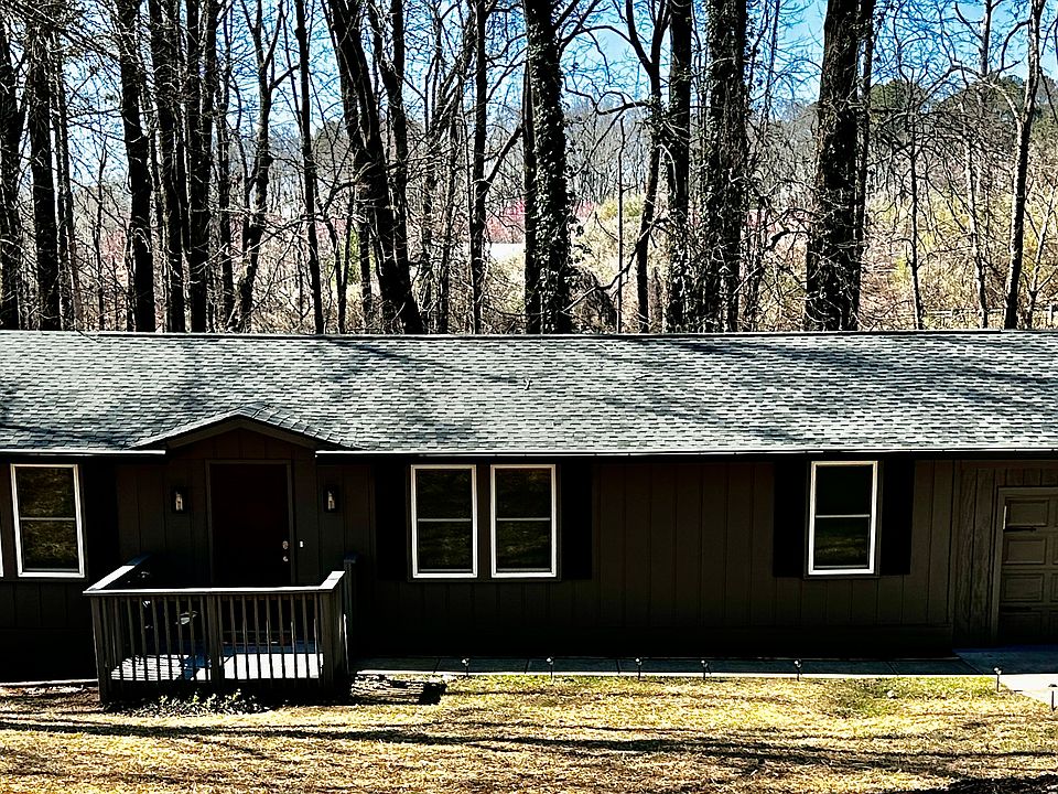 New roof and paint on outside with black gutters and shutters