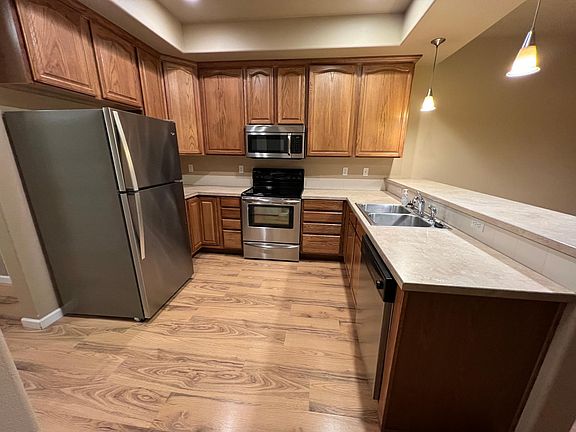 Kitchen with adjacent bar