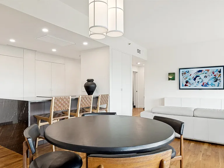Even with the giant island and substantial furnishings, the space feels light and open.