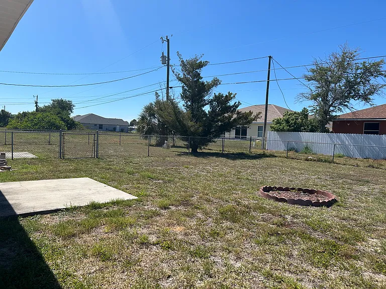 Concrete patio- huge fenced backyard