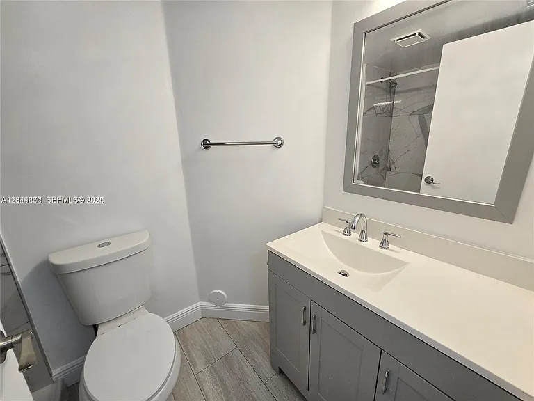 2890 N Oakland Forest Dr #102 — Photo 14