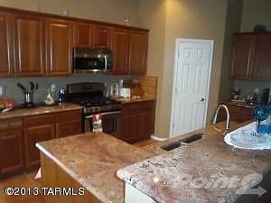 granite counters & tiled backsplash