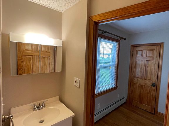 full bathroom vanity and medicie cabinet.