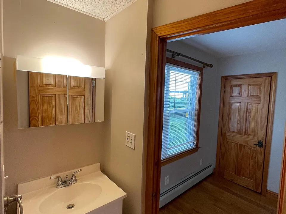 full bathroom vanity and medicie cabinet.