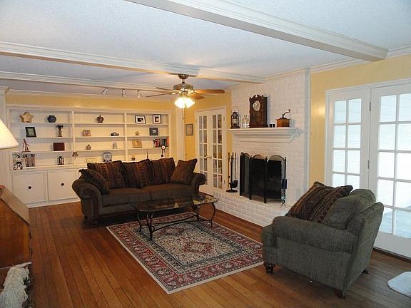 Den with Fireplace and beautiful Built-ins