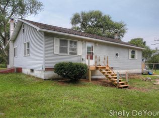 211 Elm St, Howard City, MI 49329