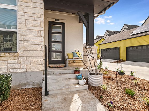 Charming front porch with side yard access