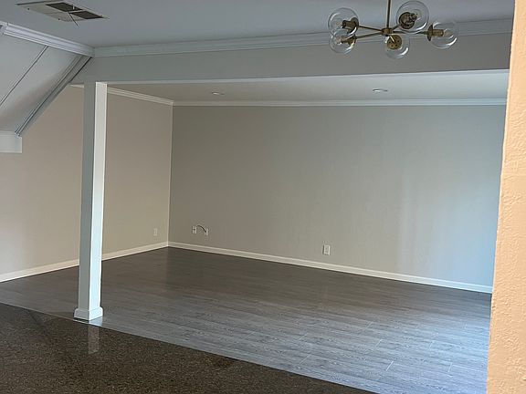 view from kitchen out to dining and living room