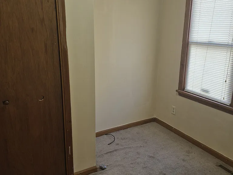 Small back room with closet