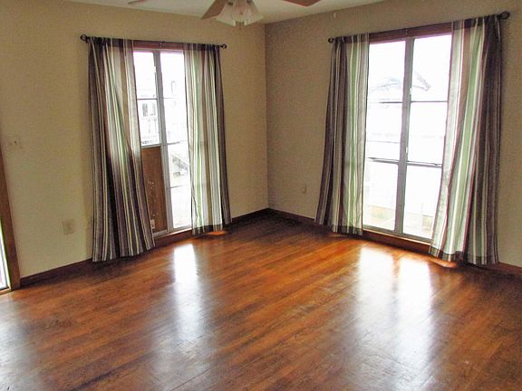 Living room; the wood has been removed and glass replaced no