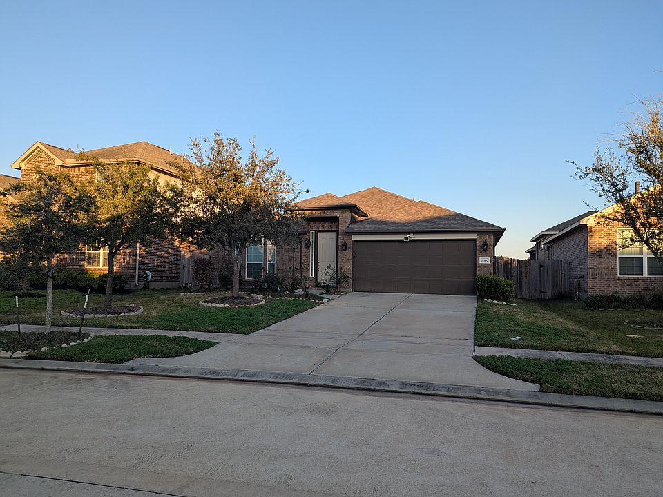 Front of home, on a quiet street in a desirable school district