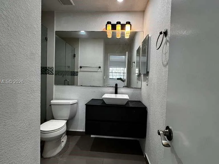 907 NE 199th St #204 — Photo 14