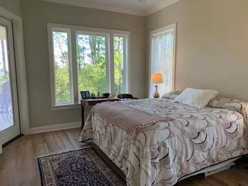King bedroom two with walk out to lanai, direct connect to bath. - 2209 Coquina Dr