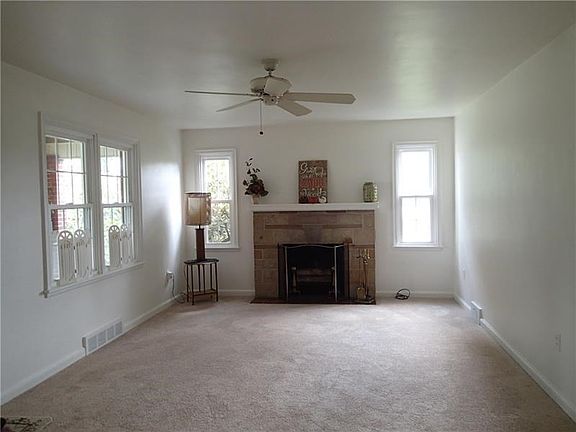 Nice New Neutral Carpeting! The living room is light and bright!