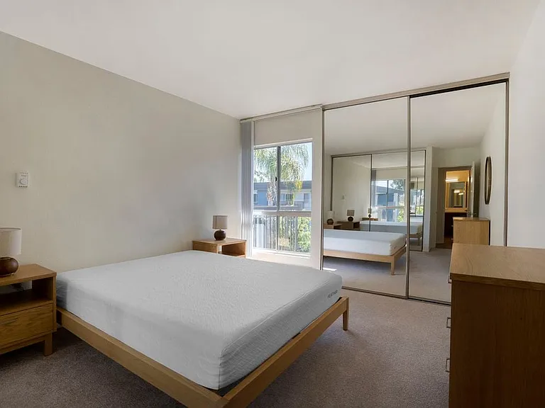 Furnished+ apartment homes feature queen bed with mattress, dresser, nightstands, and lamps.(Representative Image exact items and style of furnishings may vary)