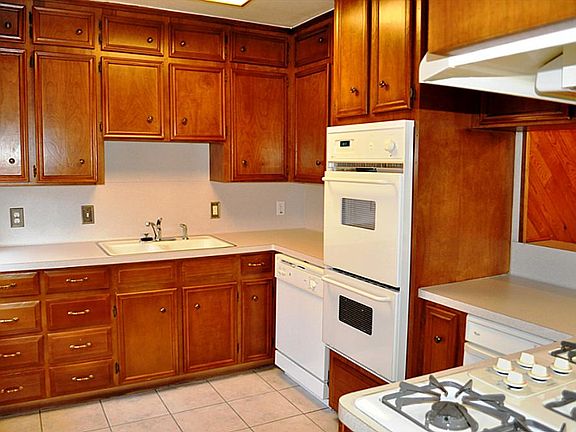 Kitchen has recent appliances,& plenty of cabinets.