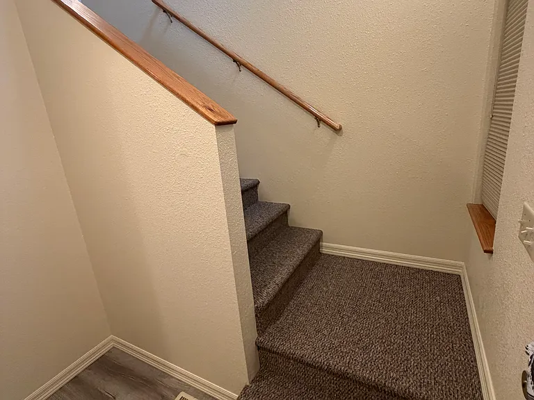 Stairs to bedrooms.